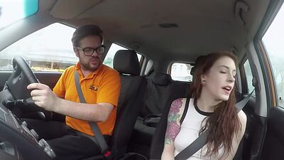 Tattooed medium tits babe fucked in car by instructor