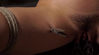 Slave in back arch position whipped