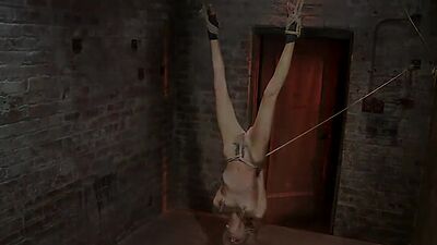 Blond in upside down suspension whipped