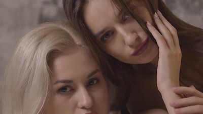 Petite Ukrainian lesbian Demi Fray caressing her GFs big natural boobs