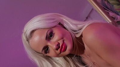 Petite small titted blonde pornstar Elsa Jean posing in sexy black lingerie