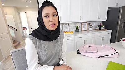 Hijab-wearing Madi Laine gives Bobby Beefcakes a blowjob