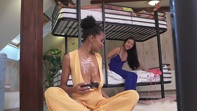Asian n Ebony babes in hostel room 3some with Hitachi helper