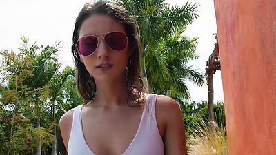 Hot big boobed Miluniel Louis peels off her sexy white swimsuit outdoor