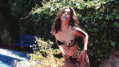 Inked all natural latina beauty Hades showing her hairy pussy outdoor