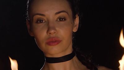 Teen Elilith Noir playing with fire and posed totally naked in the dark