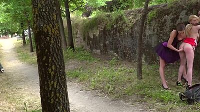 Public slut deepthroats 2 cocks after outdoor fingering