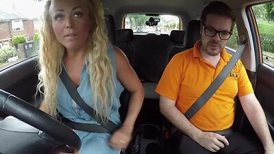 Bosomy MILF rides driving instructor in the car outdoor