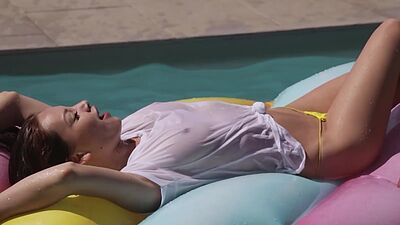 Lesbian girlfriends Estefania Pahe and Clara having fun at the pool