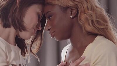 Big ass white lesbo seduces nubian dyke to rub pussies