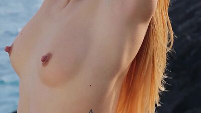 Bombastic brunette Spanish Lorena Hidalgo stripping and posing on rocks