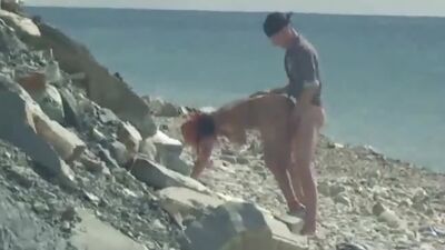 Busty babe gets fucked hard from behind under the hot sun