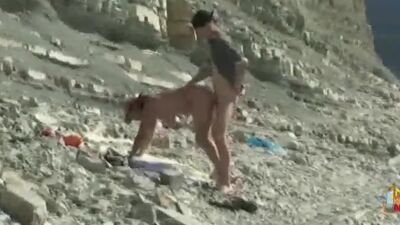 Busty babe gets fucked hard from behind under the hot sun