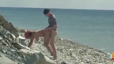 Busty babe gets fucked hard from behind under the hot sun