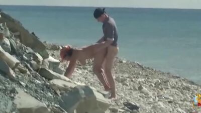 Busty babe gets fucked hard from behind under the hot sun