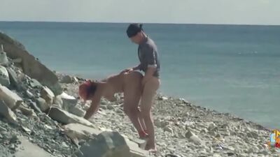 Busty babe gets fucked hard from behind under the hot sun