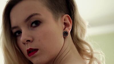 Petite all natural German blondie Alexis Emmi stripping by the mirror