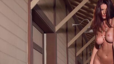 Sexy big tits redhead MILF Jaime Edmondson posed totally naked outdoor