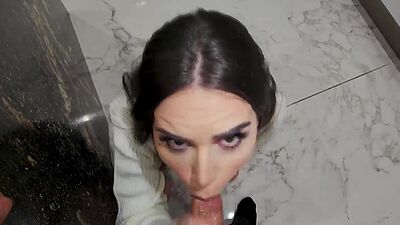 Stepmom on her knees giving her stepson a sloppy blowjob