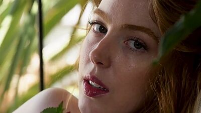 Long legged babe Erna Ohara stripping and washing her hairy redhead pussy