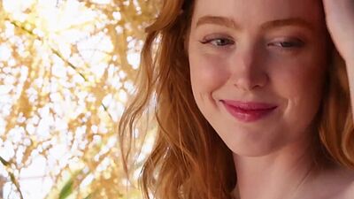 Long legged babe Erna Ohara stripping and washing her hairy redhead pussy