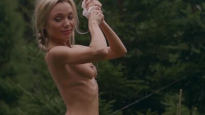 Hot naked Russian blondie Zhenya Belaya hanging out her clothes and posing