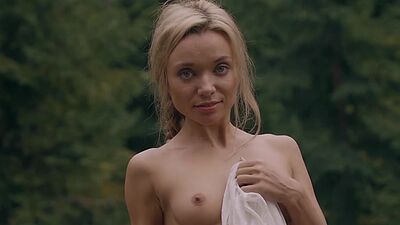 Hot naked Russian blondie Zhenya Belaya hanging out her clothes and posing