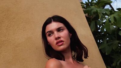 Bombastic naked French beauty Laura Devushcat posing by the pool outdoor