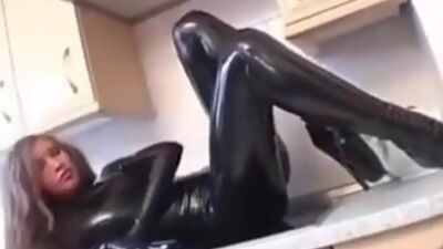 Latex kitty in catsuit