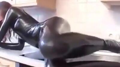 Latex kitty in catsuit