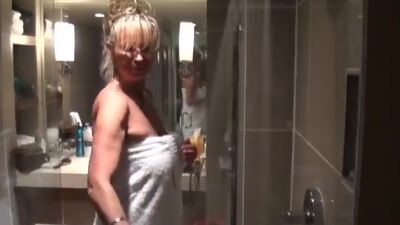 Blonde mature with pierced nipples sucks a huge peter