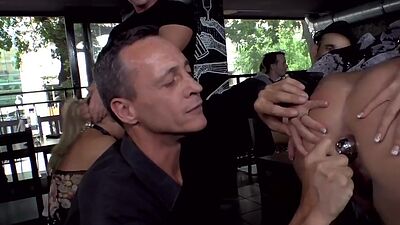 Buttplug busty MILF in heels pussyfucked in public orgy