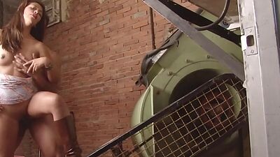 Pounding Latina construction worker on site