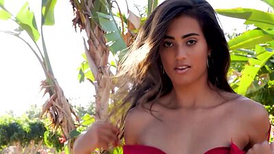 Petite latina Katherinne Sofia stripping and posing at a grove outdoor