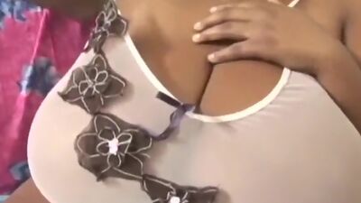 Big Black Woman with Massive Tits Shows off before getting Fucked