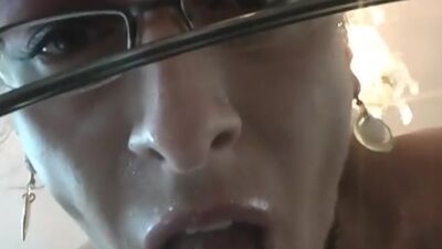 Maid Bianca masturbates and squirts on a glass table