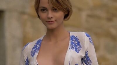 Stunning beauty enjoying a nude photo session outdoors