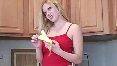 Melody goes topless and eats banana