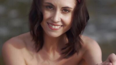 Sensual babe has an erotic slow motion session in the ocean