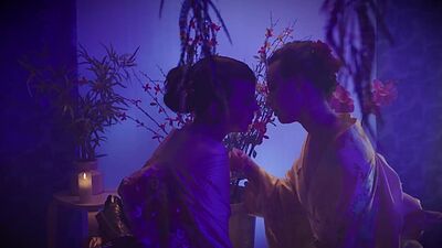 Asian shemale geisha Kasey Kei gets a footjob from Casey Calvert