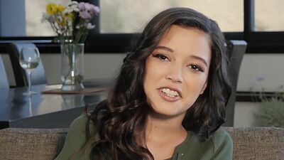 Lovely small titted brunette babe Eden Arya stripping and posing outdoor