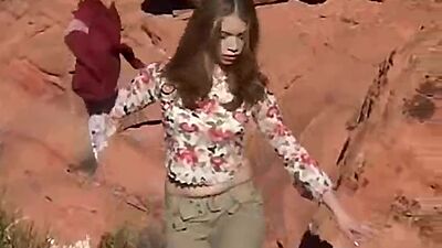 Solo teen Little April in outdoor masturbation