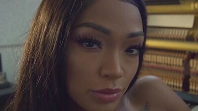 Big boobed inked ebony beauty Harley Dean reveals her shaved pierced pussy