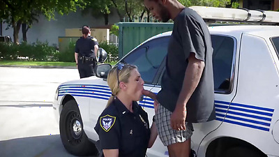 Busty police officers IR banged in the middle of the street