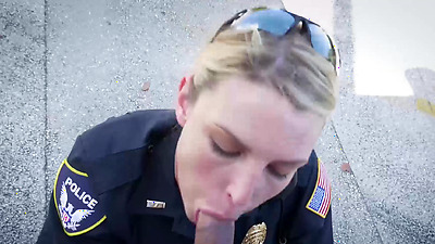 Busty police officers IR banged in the middle of the street