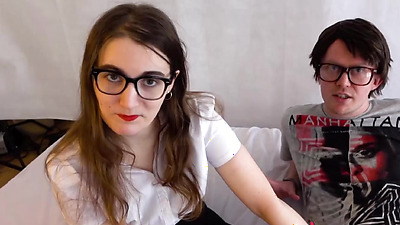 Pretty young lady swallows two big cocks with passion