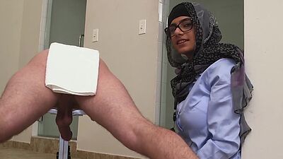 Muslim babe Mia Khalifa jerks off two hanging hard cocks