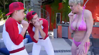 Blond bombshell Dee Williams fucks two young cocks