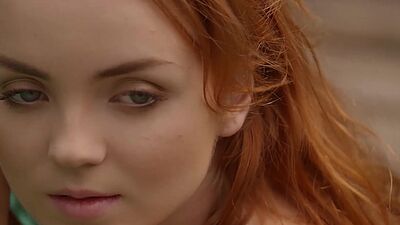 Petite redhead teen posing totally naked after posing in sexy lingerie