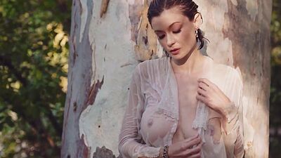 Hot blonde Russian Anna Lisa reveals her massive natural tits on a boat